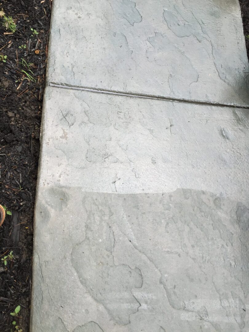 A close up of the concrete surface on the ground